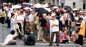 People flock to get tickets to Knock Yokoyama's trial
